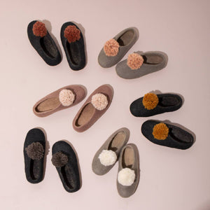 Perfect for cozy nights, and lazy days, MULXIPLY's hand-felted Pom Pom Slippers are as playful as they are functional.