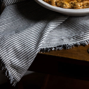 Striped cotton napkin with fringe edge. Handmade for Ember Maine.