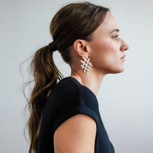 Contemporary tic tac shape earrings