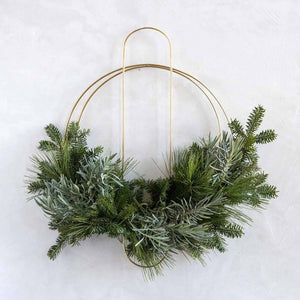 Modern holiday wreath by Mulxiply and Campfire Pottery. Artisan-made.