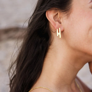 Modern, drip shape stud earrings by Mulxiply