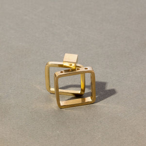 Stackable square rings handcrafted by artisans in Nepal.