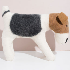 Life-sized stuffed terrier. Handmade felted dog. Terrier made by fairtrade artisans.
