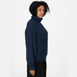 Handmade chunky soft knit sweater in navy blue.