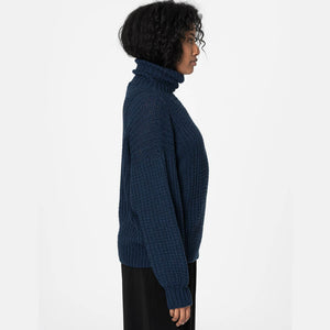 Women's navy blue sweater in merino wool.