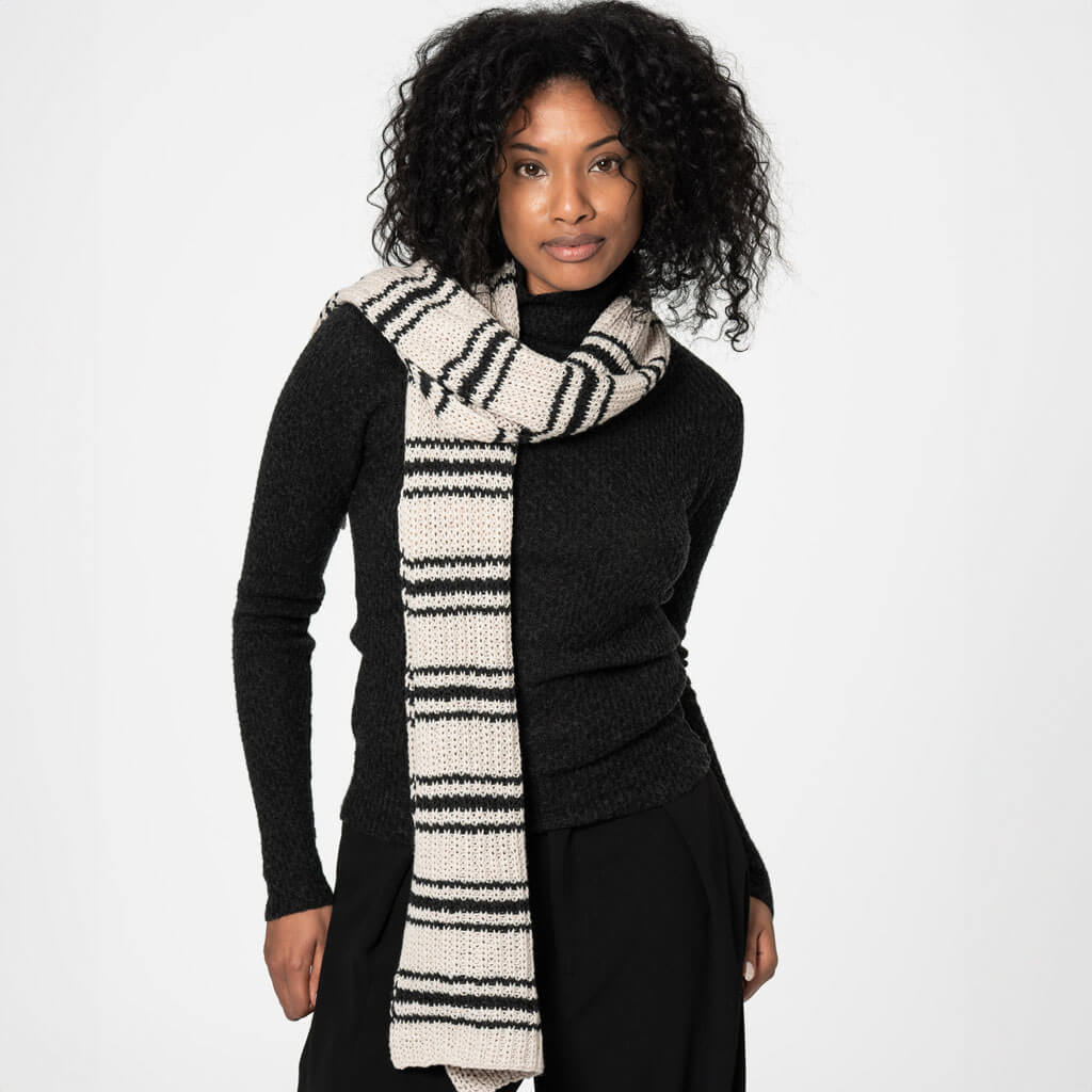 Cozy black and off-white striped scarf.
