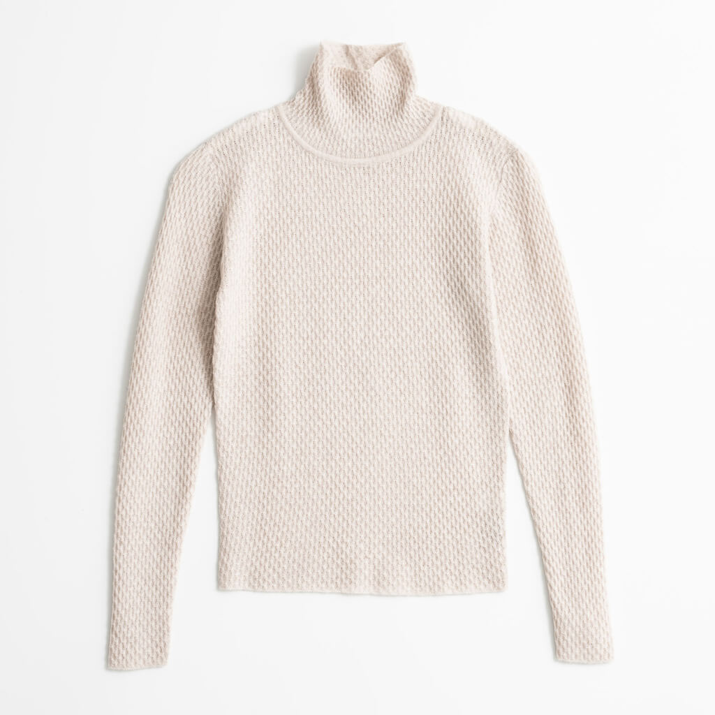 Lace knit turtleneck in natural white