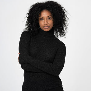 Fitted turtleneck in soft merino wool.