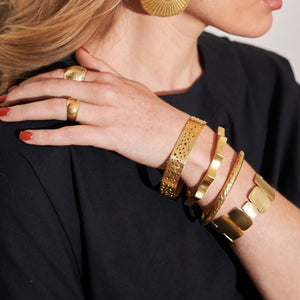 Stackable, gold bangle bracelets by Mulxiply