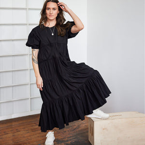 Black cotton swingy ruffle dress by Mulxiply
