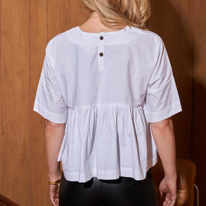 White blouse by Mulxiply with small buttons