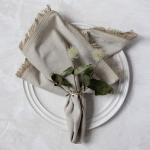 Handwoven Fringe edge napkin in tan by Mulxiply and Campfire Pottery