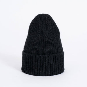 Hand knit black beanie. Ethically made in Nepal.