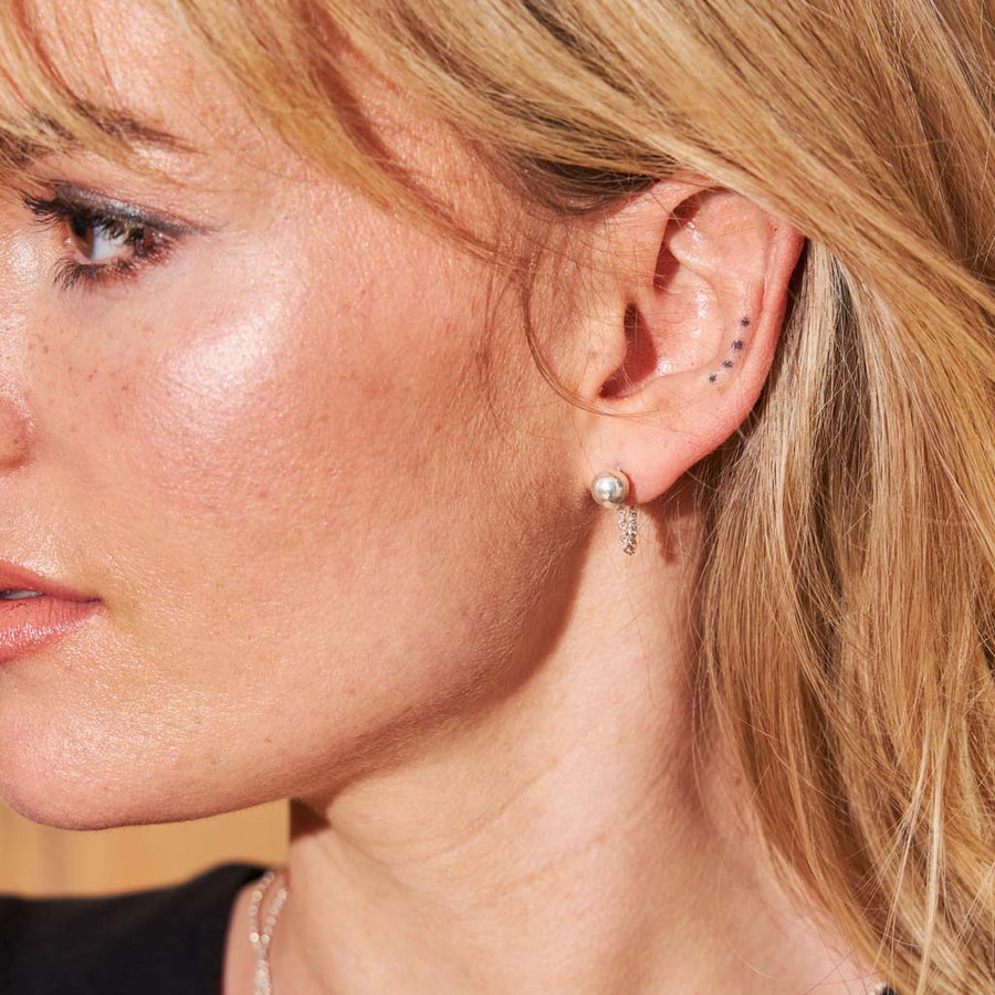 Tethered Droplet Earrings in Sterling Silver with connected backing