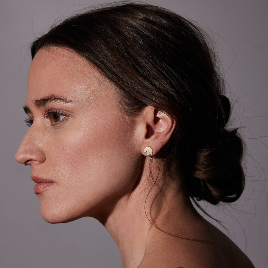 Tiny flower shaped earrings by Mulxiply