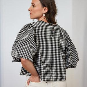 Bubble sleeve blouse by Mulxiply in black and white gingham.