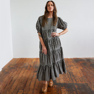 Ethically crafted tiered ruffle dress by Mulxiply in black and white gingham