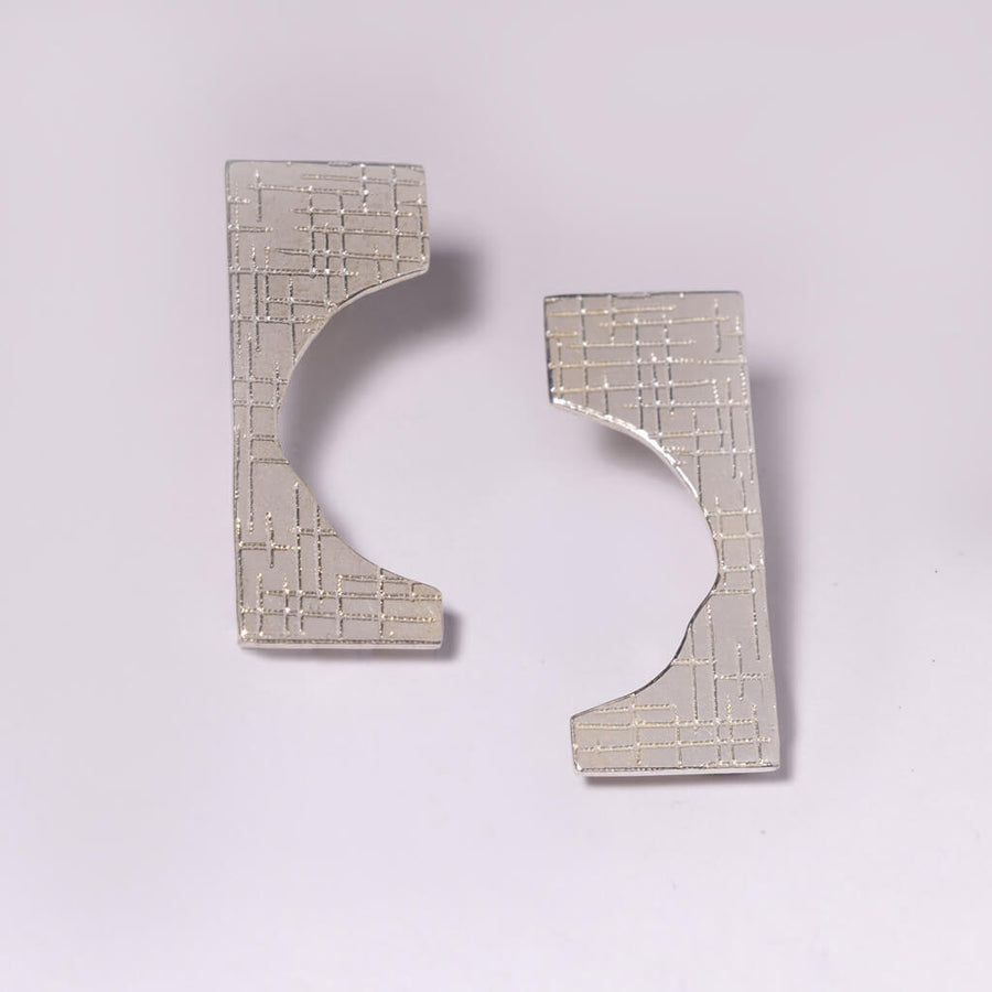 Mid-century inspired small statement earrings with hatch imprint in sterling silver