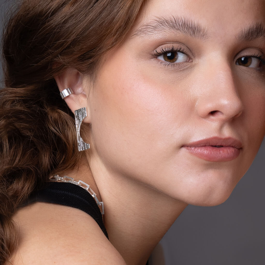 Mid-century inspired small statement earrings with hatch imprint in sterling silver