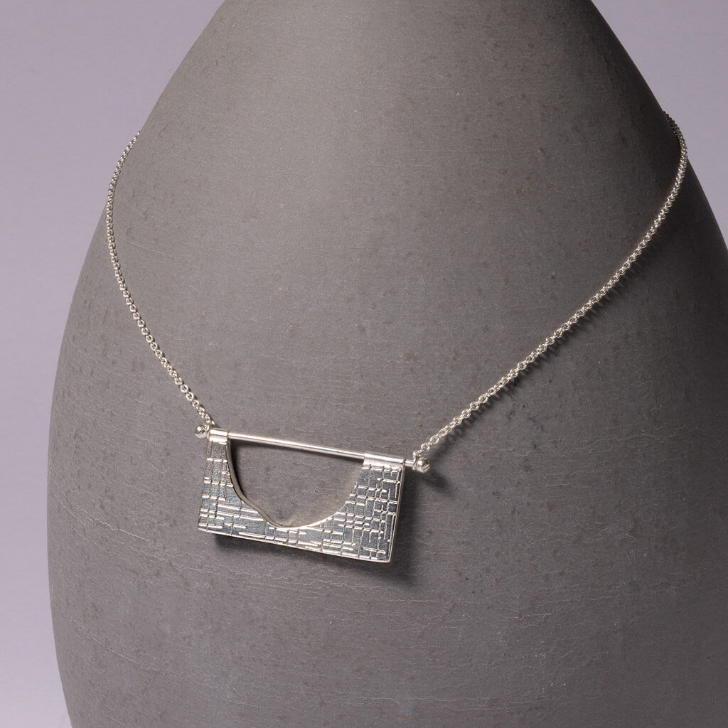 Mid-century modern design. Collectible jewelry by Mulxiply.