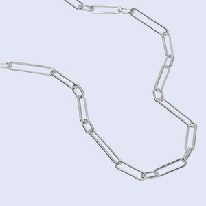 Handmade paper clip chain by Mulxiply. Sterling Silver statement jewelry.