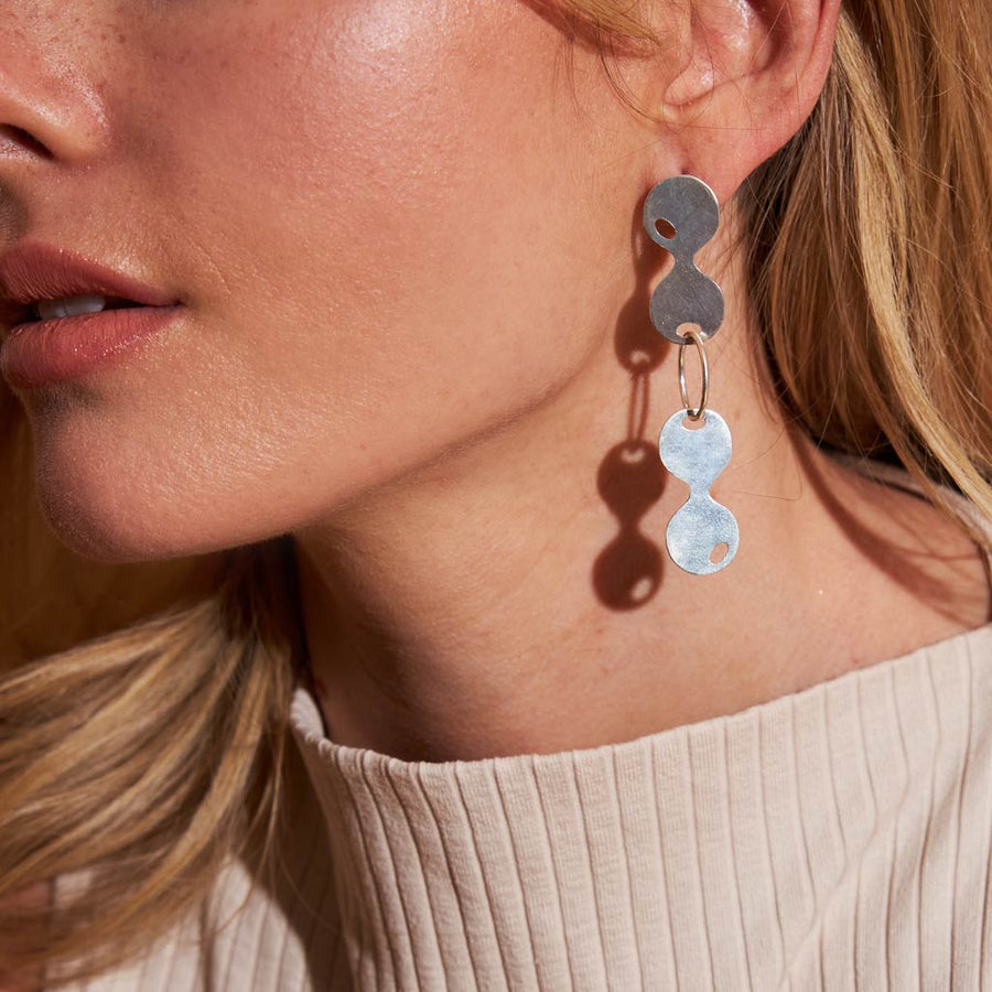 Bubble-shaped mod earrings by Mulxiply