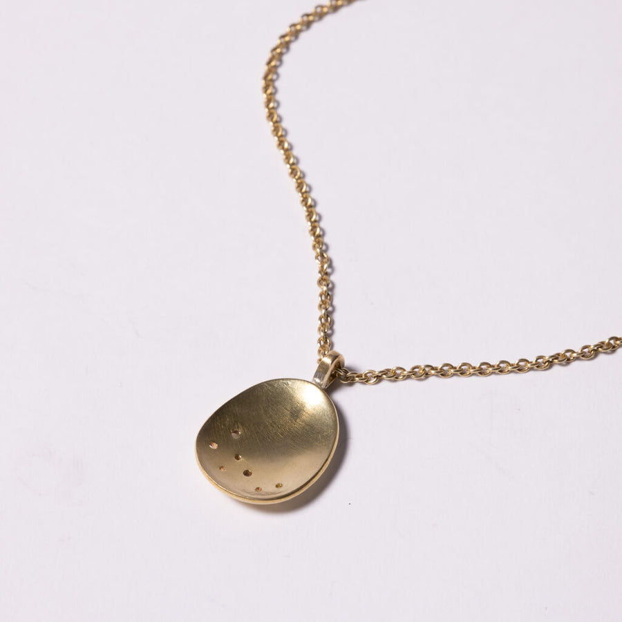 Celestially-inspired necklace by Mulxiply.