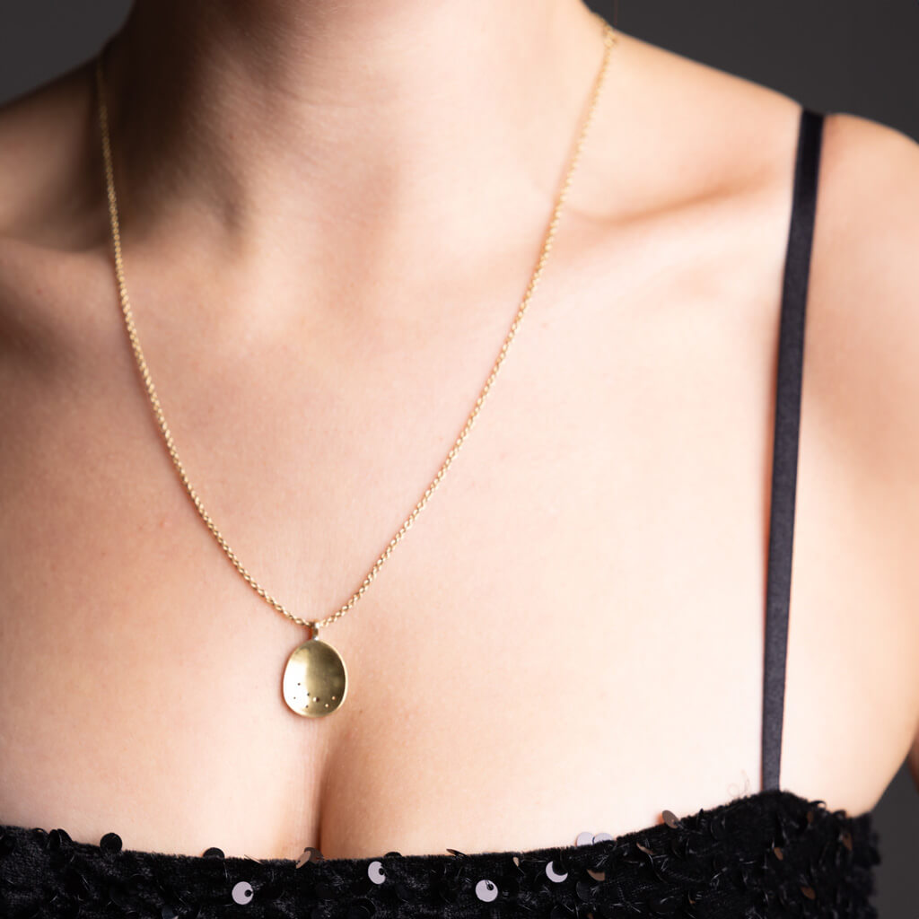 Celestially-inspired necklace by Mulxiply.