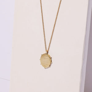 Handmade oval locket shape necklace.