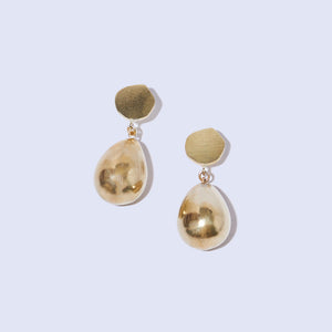 Pod shaped earrings in brass, crafted by hand in Nepal