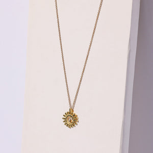 Elegant sunshine charm necklace, ethically crafted in Nepal