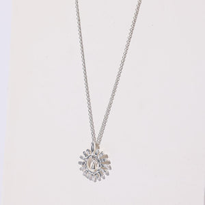 Delicate sun-shaped layering necklace, ethically made by Mulxiply
