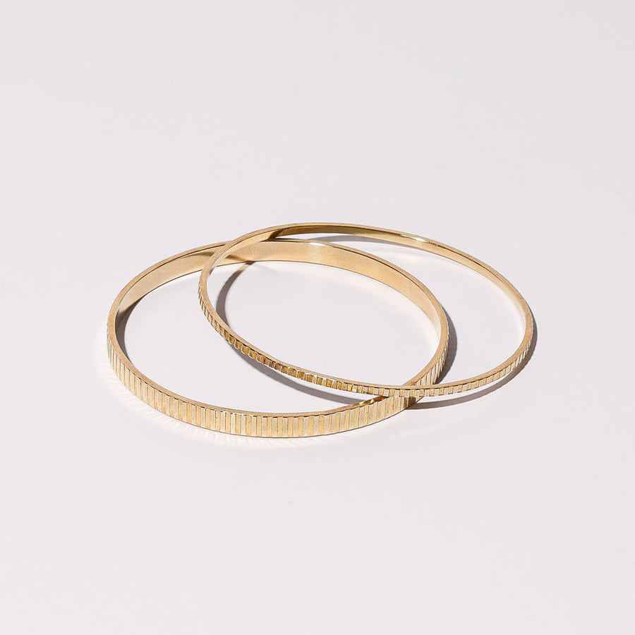Etched, stacking bangles by Mulxiply