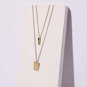 Minimal layering necklaces by Mulxiply.