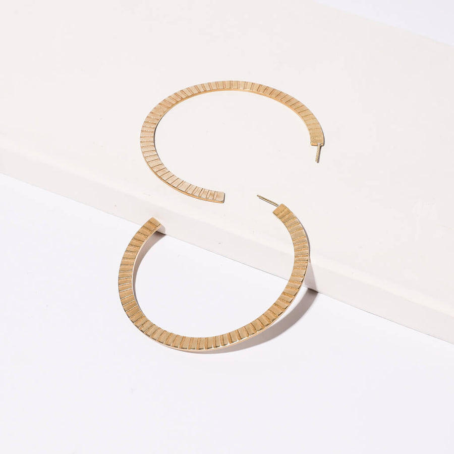 Ridge Hoop Earrings in brass by Mulxiply