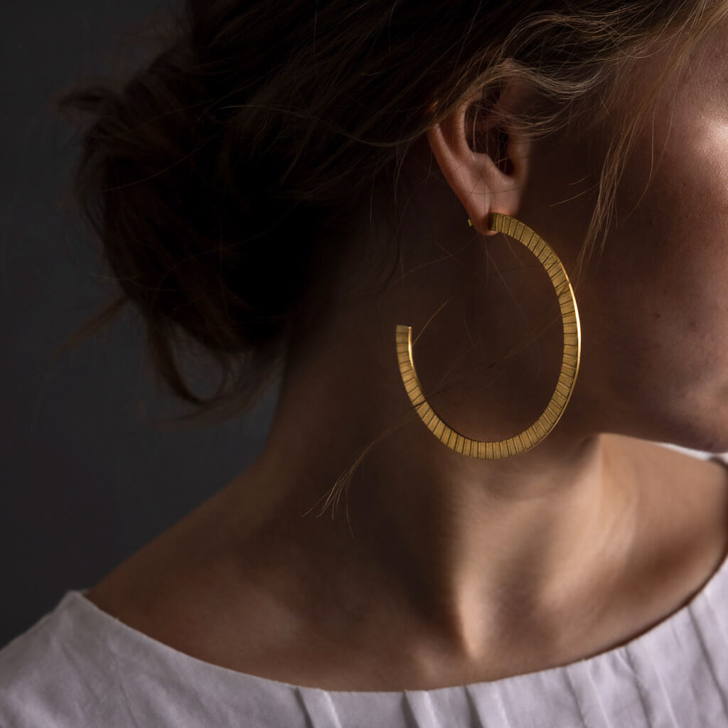 Ridge Hoop Earrings in brass by Mulxiply