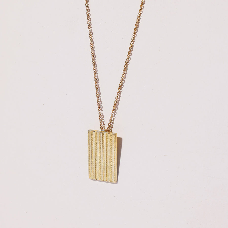 Rectangular Locket Necklace with etched lines by Mulxiply in brass