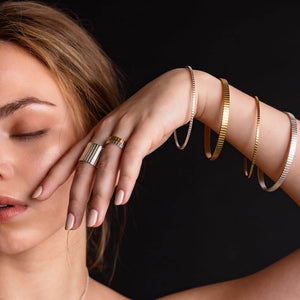 Modern, linear stacking rings in brass or sterling.
