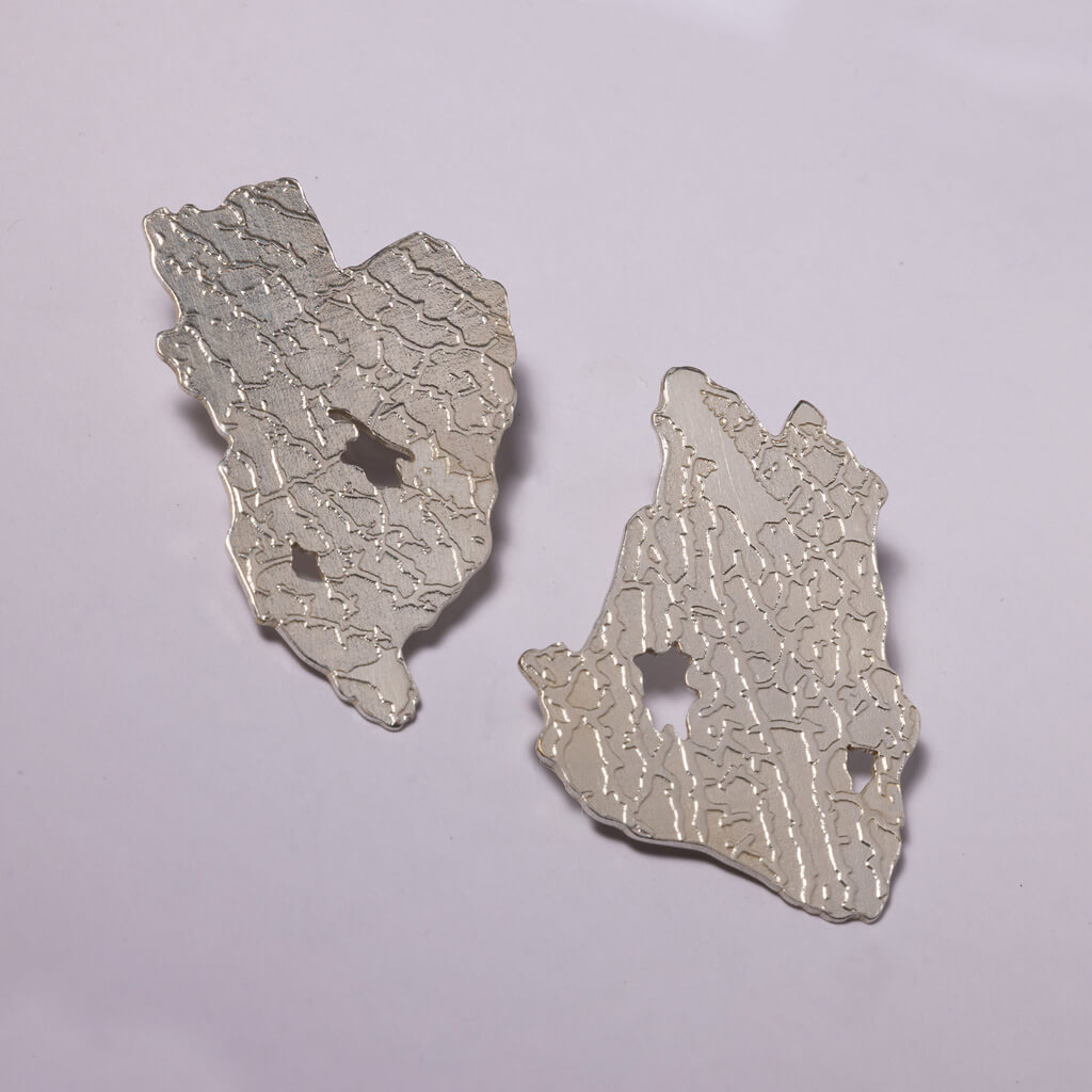 Sterling Silver Statement Earrings that celebrate unknown territory.