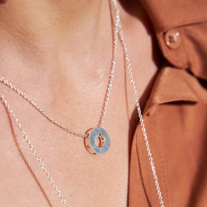 Simple Wheel charm necklace on a dainty chain