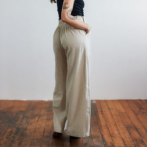 Flattering easy cotton pants in pinstripe pattern by Mulxiply. Ethically made.