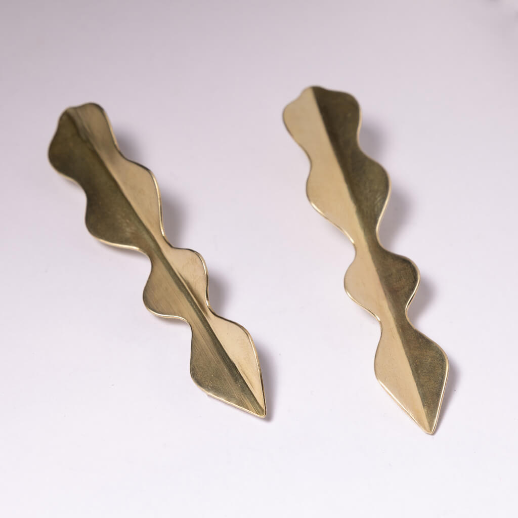 Curvy, dagger shaped brass earrings