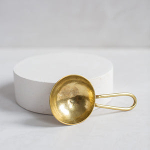 Hammered brass coffee spoon. Ethically made by Mulxiply for slow living.