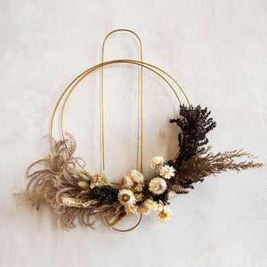 Modern wreath with dried flowers by Mulxiply and Campfire Pottery