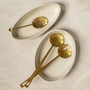 Handmade serving utensils for Ember in Portland, Maine. Kitchen tools by Campfire Pottery.