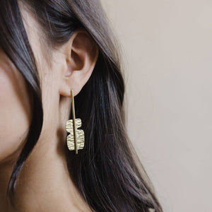 Handmade mid-century modern shaped earrings by Mulxiply.