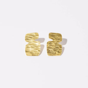 Designed in Maine, made in Nepal, these simple brass earrings are the perfect everyday earring.