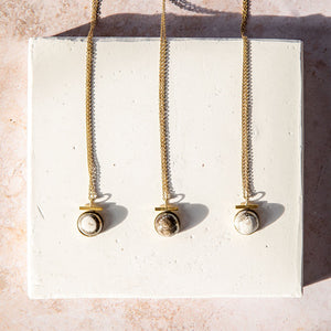 Gorgeous gem-like pottery and brass necklace ethically made by fairtrade artisans.