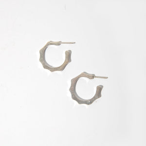 Sterling Silver hoop earrings that are modern with a little edge.