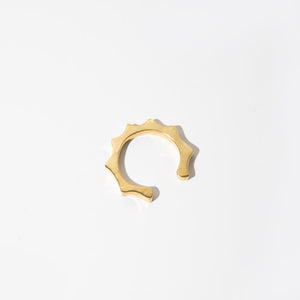 Adjustable brass cuff ring. Designed to look like a crown.
